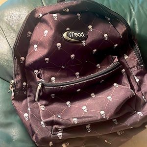 Mead backpack with Skelton design. EUC.